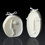 Heart-shaped hands candle