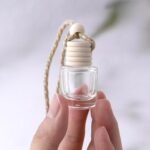 Colorful empty car air freshener bottle